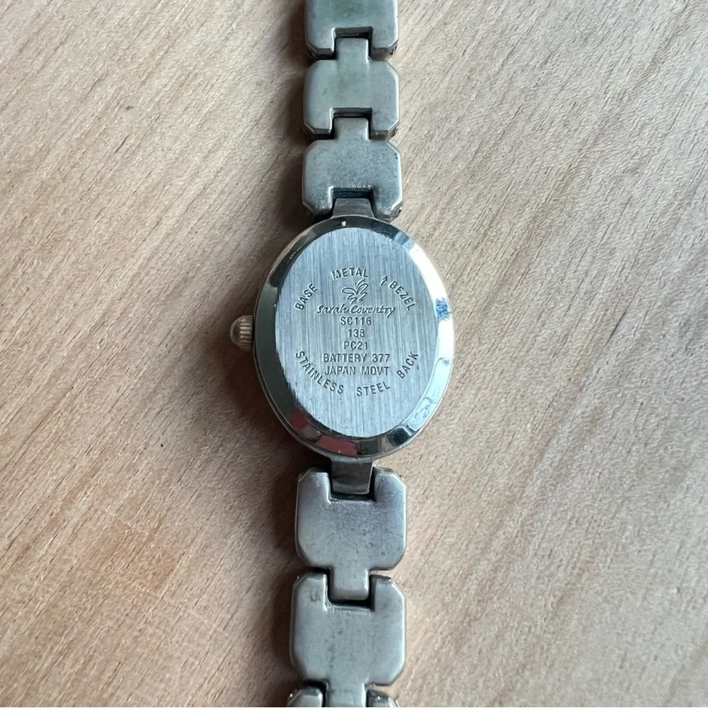 Sarah Coventry ladies oval silver tone diamond dress Watch NEW BATTERY